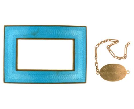 AN ART DECO BLUE GUILLOCHE ENAMELLED BRASS BUCKLE CONVERTED TO A BROOCH, AND A GOLD IDENTITY BRACELET, MARKED 9CT, 1.5G++ID B