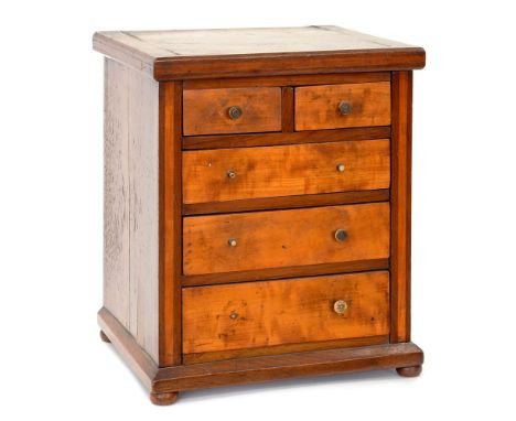 A VICTORIAN MAHOGANY AND LIGHT WOOD MINIATURE CHEST OF DRAWERS, 32CM H 