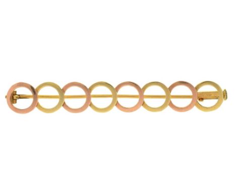 A TWO COLOUR GOLD BROOCH,  MARKED WITH OAK LEAF AND MAKER, 2.5G ++LIGHT WEAR CONSISTENT WITH AGE 