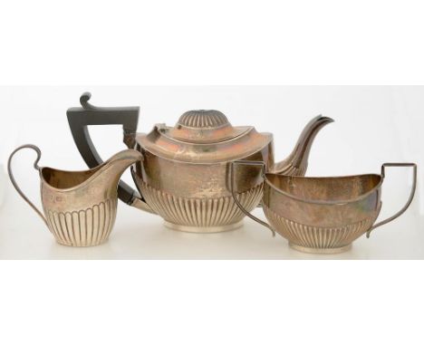 A SILVER THREE PIECE COMPOSED TEA SERVICE, TEAPOT 9.5 CM H, BIRMINGHAM 1876 AND 1905, TEAPOT MARKS RUBBED, 12 OZS 4DWTS++TARN