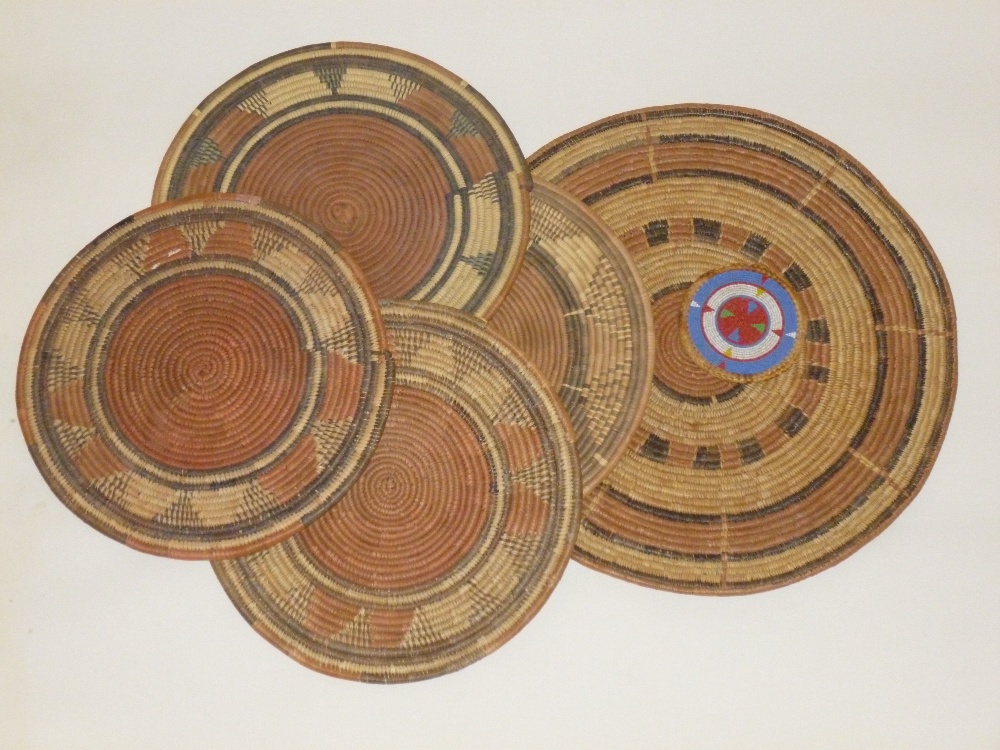 SIX WEST AFRICAN STRAW/GRASS MATS WITH DYED PATTERN (ONE WITH BEADWORK