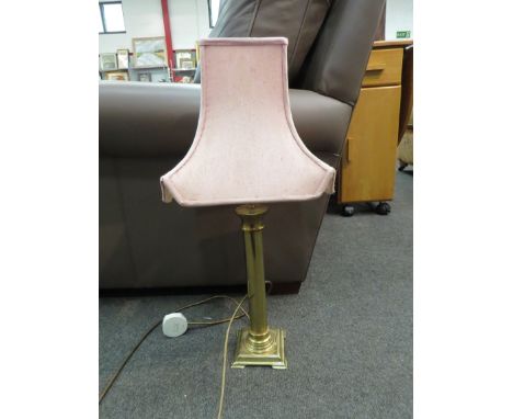 A brass column form table lamp 