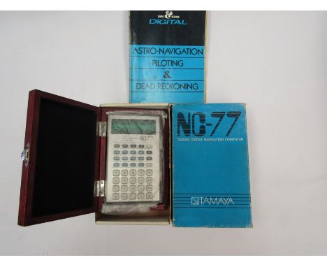 A Tamaya NC-77 celestial Navigation Computer, boxed with manual 