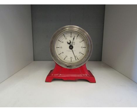 A 1930's red enamel Kodak timer with crescent moon hand 