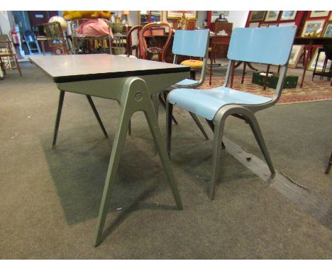 A post-war mid century Esavian (ESA) child's school table and two chairs. The formica table on aluminum 'compass' legs which 