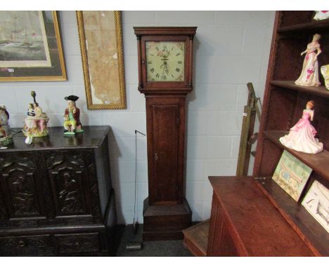 An oak longcase clock with painted floral enamel dial, weights and pendulum