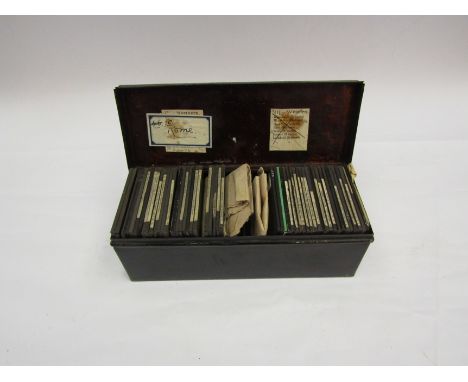 A collection of 47 magic lantern slides, European scenes, in metal tin   