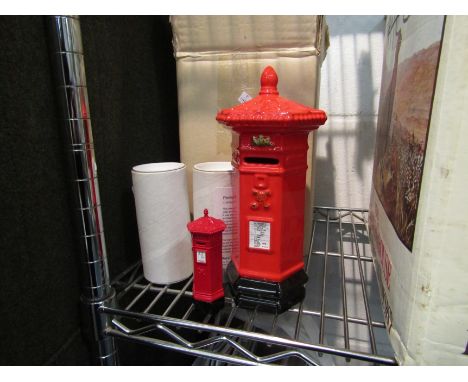 A boxed ceramic postbox design money box and two 1:19 scale die-cast pillar boxes