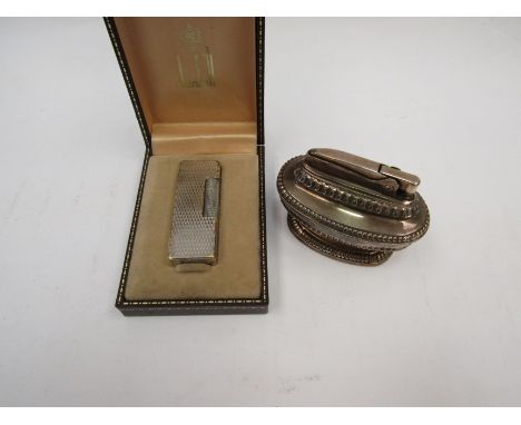 A cased Dunhill cigarette lighter and a Ronson table lighter (2)