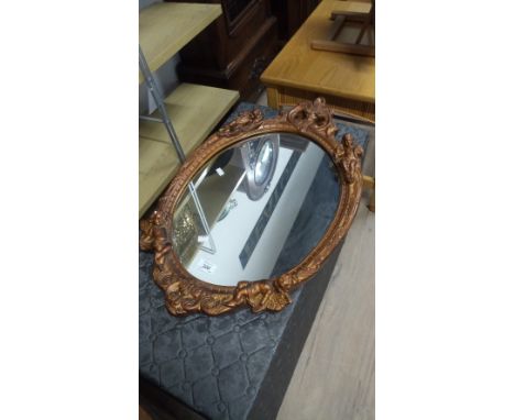 ORNATE FRAME OVAL MIRROR