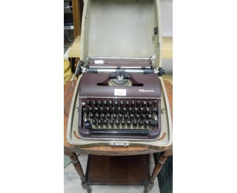 VINTAGE OLYMPIA TYPEWRITER IN ORIGINAL CASE & OCCASIONAL TABLE