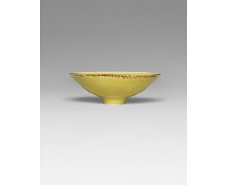 Lucie RieFooted bowl, circa 1965Porcelain, yellow glaze, manganese lip. 6.4 cm high, 18.8 cm diameterImpressed with artist's 