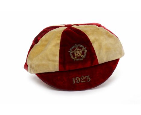 ENGLAND INTERNATIONAL CAP PRESENTED TO SETH LEWIS PLUM (1899 - 1969)in crimson and natural coloured velvet quarters, the peak