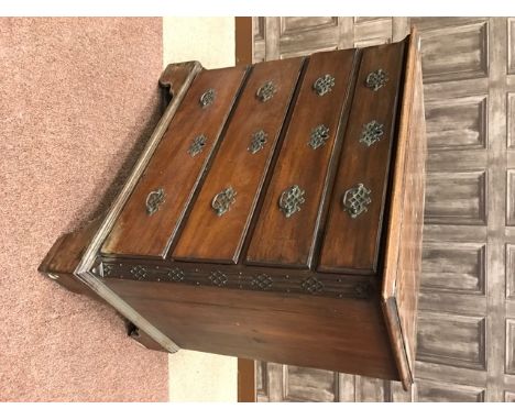 REGENCY MAHOGANY OBLONG CHESTof four graduated drawers, the chamfered edges of fretted design, on bracket feet, 83cm high, 83