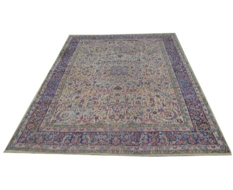 A Lavar Kirman carpet, with full bold floral design, 375 x 278cms.