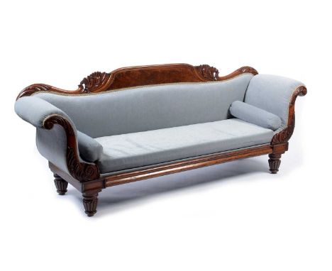 A Victorian mahogany scroll end sofa with carved acanthus leaf and shell detail to top rail, the arms with carved leaf detail