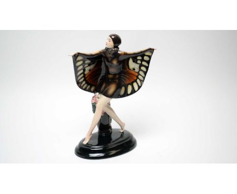 Joseph Lorenzl (1892-1950) for Goldscheider. A Goldscheider earthenware figure of the Butterfly Girl or 'Captured Bird', circ