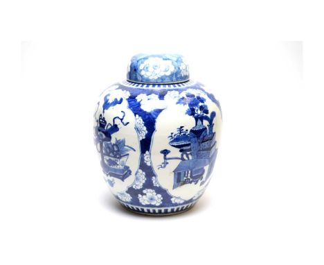 A Chinese blue and white ginger jar and cover, in Kangxi style, 19th Century, decorated with barbed panels of antiques on a c