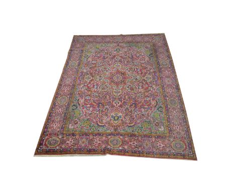 Lavar Kirman carpet, the central rosette with bright floral scrolls, 522 x 392cms.