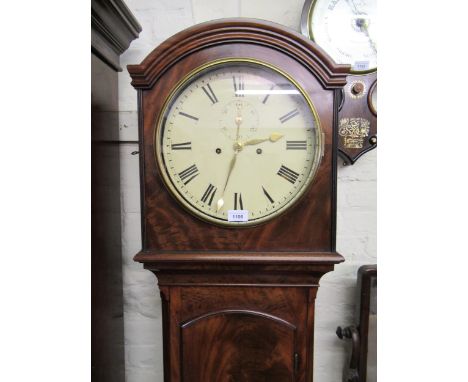 George III mahogany longcase clock, the arched hood above an arched door raised on bracket feet, the circular enamel dial wit