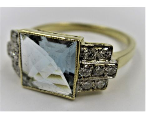 18ct Yellow gold Art Deco style ring set with a central square aquamarine with diamonds each side, suze N 