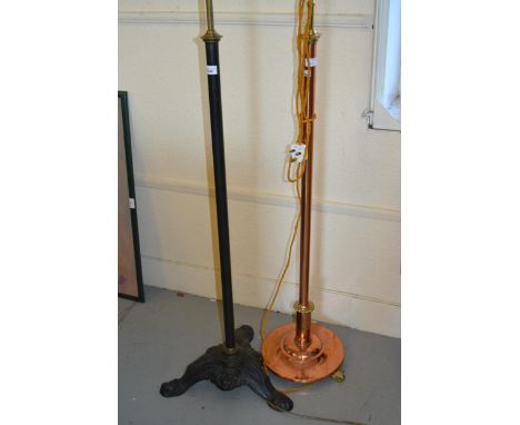 Early 20th Century copper and brass mounted adjustable lamp standard, together with another similar with cast iron base 