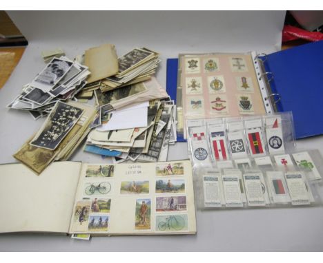 Metal deed box containing a quantity of vintage photographs, postcards, cigarette cards etc. 
