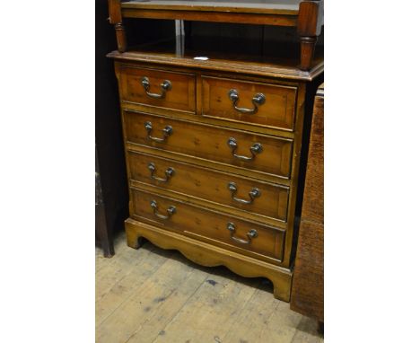 Small reproduction yew wood chest of two short and three long drawers on bracket feet 