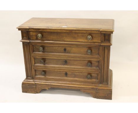 Pair of Venetian walnut dwarf chests, the moulded tops above four drawers raised on bracket feet, 35ins x 16ins x 27.5ins hig