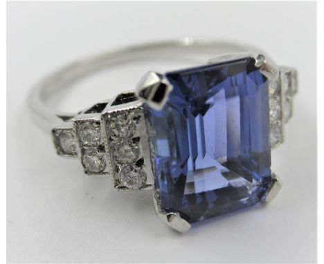 Platinum ring set with a square cut tanzanite with diamond set shoulders, Size O9mm x 6mm 