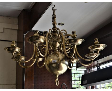 Large 19th Century Dutch eight light chandelier with a knopped baluster centre column and scroll shaped arms, 29ins high over