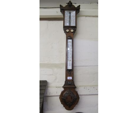 Victorian carved oak stick barometer by J.H. Steward, London 