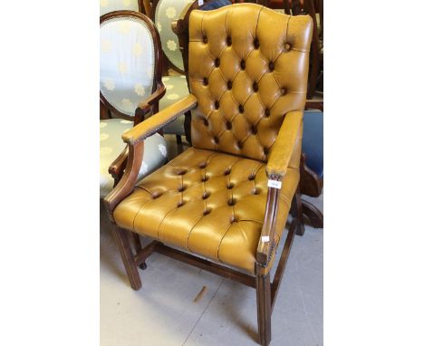 20th Century light tan leather button upholstered open elbow chair on square moulded front supports 