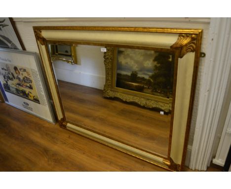 Reproduction gilt and cream lacquered bevelled edge wall mirror, 39ins x 49ins 
