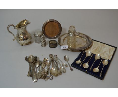 Small silver mounted photograph frame, napkin ring, pepper, two silver mounted dressing table bottles and a quantity of silve