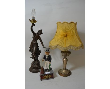 Reproduction painted cast iron Uncle Sam money box, a plated table lamp and a bronzed composition figural table lamp 