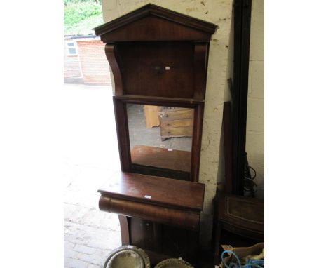 19th Century French mahogany console table with mirror, the arched top above rectangular mirror plate and a scroll form base 