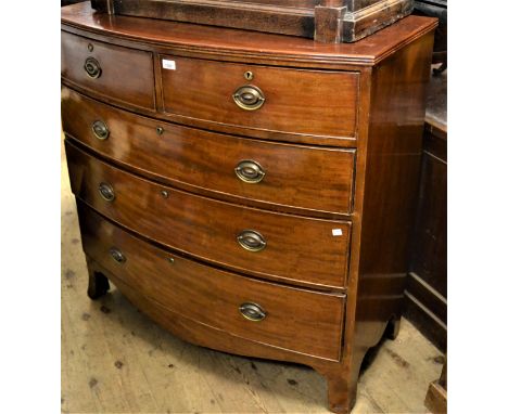 19th Century mahogany bow front chest of two short and three long graduated drawers with oval brass handles and splay bracket