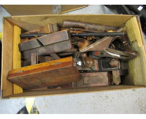 Trunk containing a quantity of various woodworking tools 