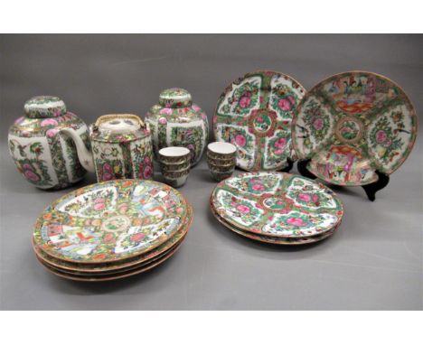 Eight Canton famille rose plates, two ginger jars, teapot and six cups 