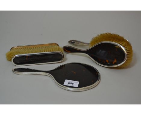 Birmingham silver and tortoiseshell mounted five piece dressing table set, including hand mirror (at fault) 