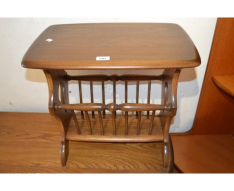 Ercol elm coffee table / magazine rack 