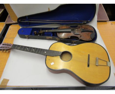 Late 19th / early 20th Century violin with 14in two piece back bearing label, with single bow in fitted case (at fault) and a