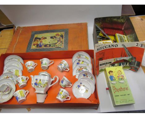 Boxed set of children's nursery tea ware, a ' Playtune kiddie cutlery set ' in original box, with musical movement and a smal