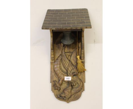 Carved oak bell bracket decorated with a dragon, possibly Black Forest region 