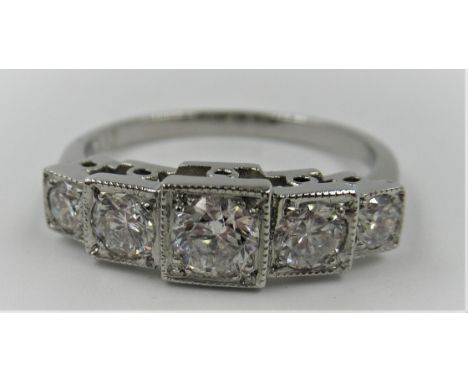 Platinum ring set with with five diamonds in box style, size N 