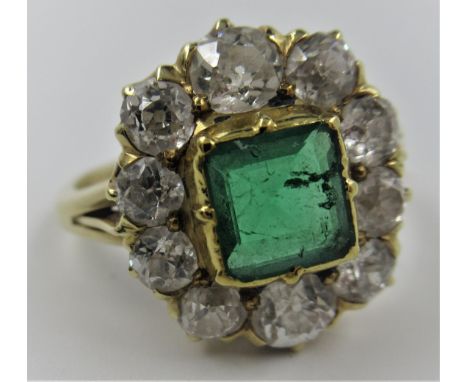 18ct Yellow gold emerald and ten stone diamond ring, the centre stone approximately 5mm square, size P.5 