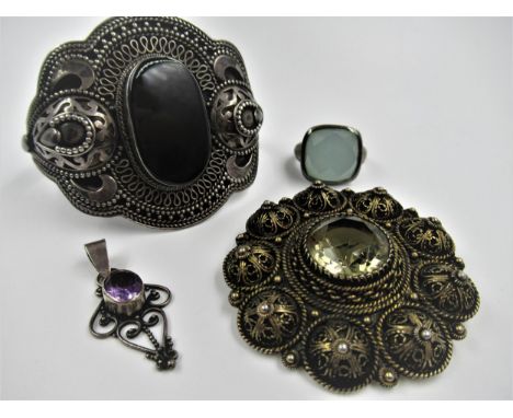 Silver half hoop bangle, Israeli silver circular brooch, silver pendant and a silver Kit Heath dress ring 