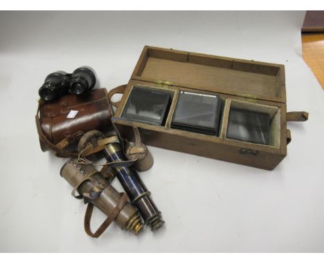 Cased pair of binoculars, two reproduction brass telescopes and a boxed quantity of glass lantern slidesOptics intact. Moving