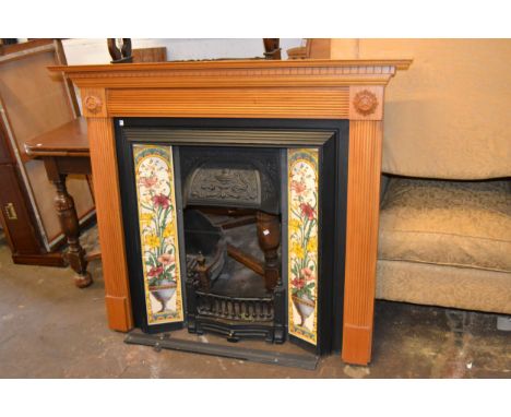 Reproduction oak and painted metal and tile inset fire surround, 51.5ins wide x 44ins high 